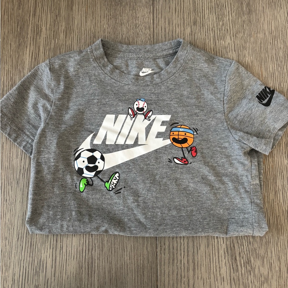 Nike Gray Short Sleeve Tee with Playful Sports Graphics